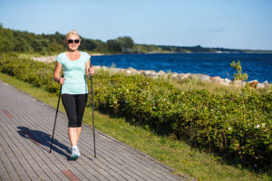 woman exercising by walking.